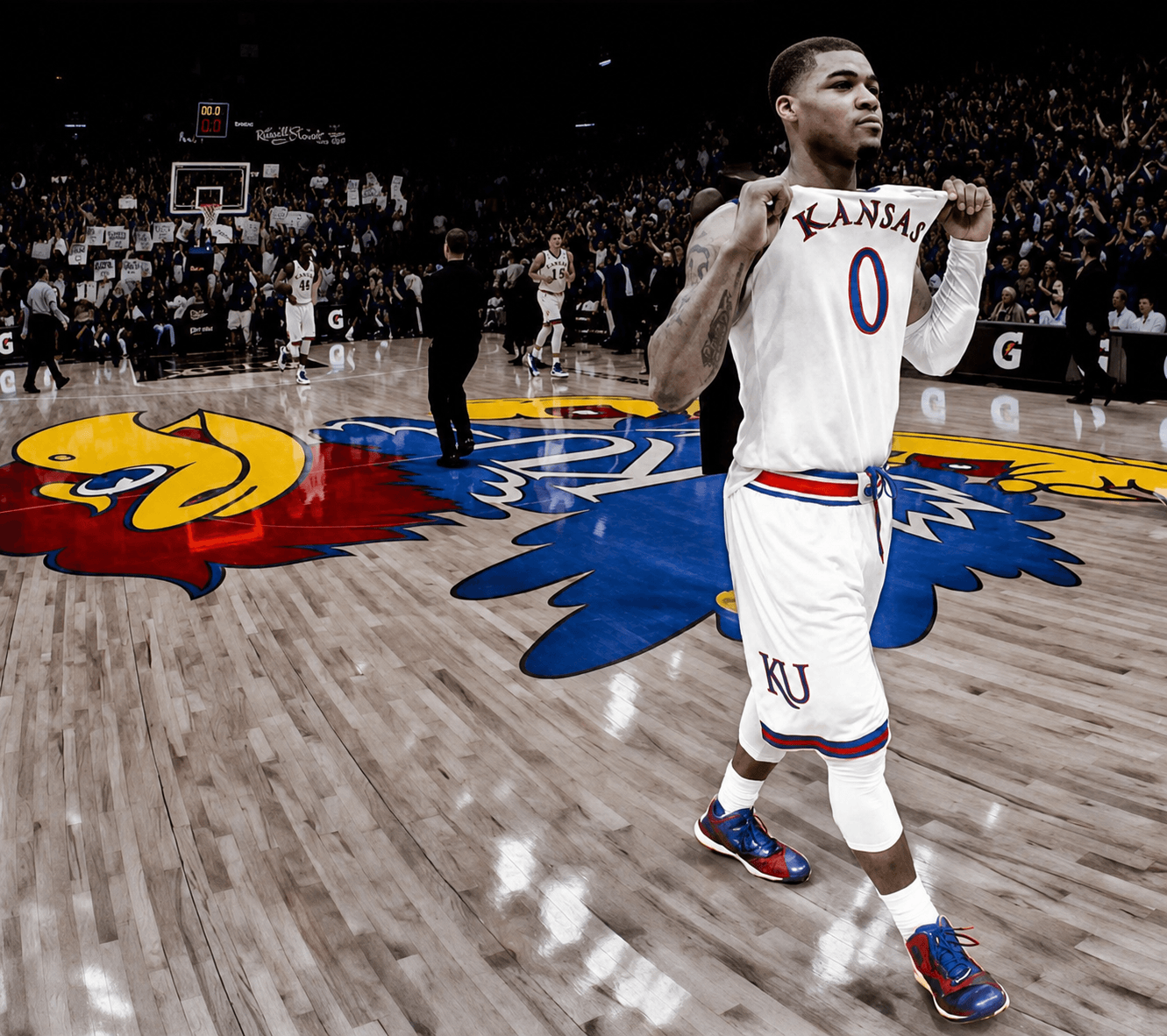 A Kansas Jayhawks player holding out his number 0 jersey on the Jayhawk court graphic